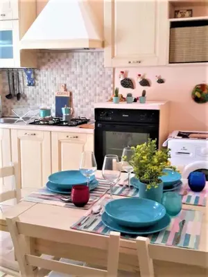 Cucina o angolo cottura di Casa Vacanze Donna Manu- Centralissima Tra Stazione Centrale ed Aeroporto