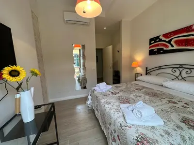 Letto o letti in una camera di Domus Luca - Central Rooms in the Heart of Naples