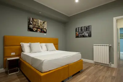 Letto o letti in una camera di Dante Maison de Prestige