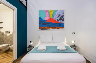 Letto o letti in una camera di Tredici Boutique Rooms