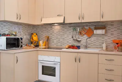 Cucina o angolo cottura di La Preziosa Apartment