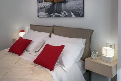 Letto o letti in una camera di La Preziosa Apartment
