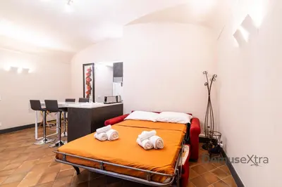 Letto o letti in una camera di Piazza San Domenico Suite By DomusExtra