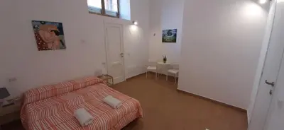 Letto o letti in una camera di Casa Laura Oliva Mancini