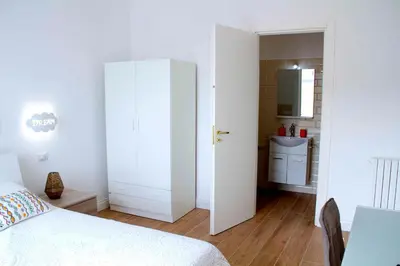 Letto o letti in una camera di Casa Fabiana