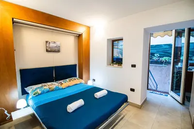 Letto o letti in una camera di La Stella di Chiaia