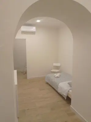 Letto o letti in una camera di DUOMO APARTAMENT'S