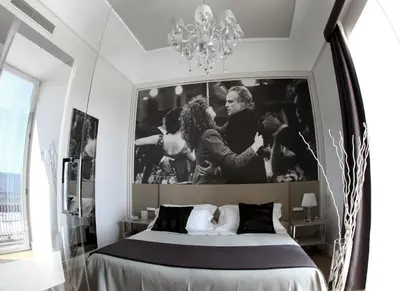 Letto o letti in una camera di Partenope Relais