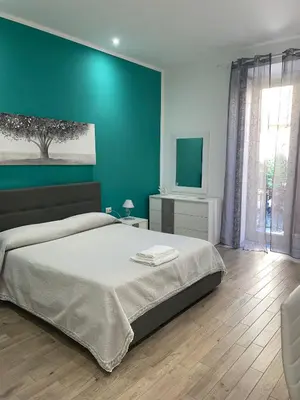 Letto o letti in una camera di Dormire a Napoli Centro Holiday House Casa Vacanza