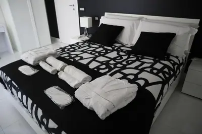 Letto o letti in una camera di Rettifilo 201 Exclusive Rooms