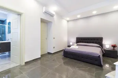 Letto o letti in una camera di Porto Rooms & Suite