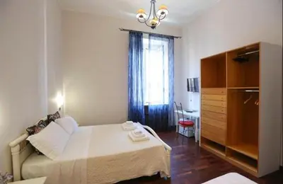 Letto o letti in una camera di B&B Residenza MALATERRA