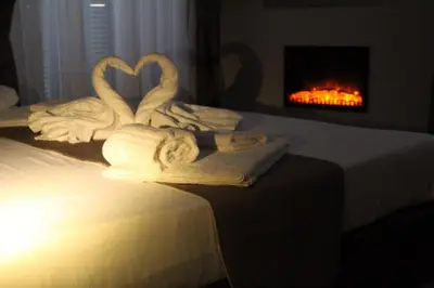 Letto o letti in una camera di Dante Relais