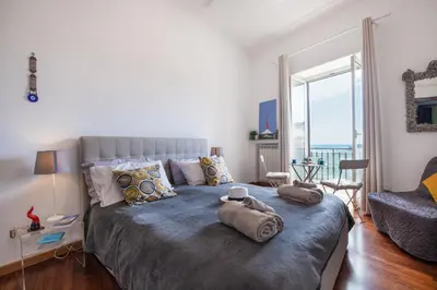 Letto o letti in una camera di NapoliCentro Mare - Sea View Rooms & Suites