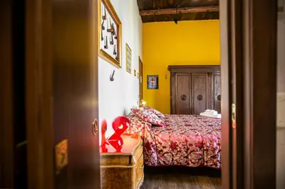 Letto o letti in una camera di San Gennaro B&B
