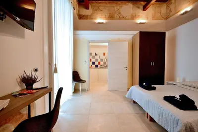 Letto o letti in una camera di Di affreschi e volte
