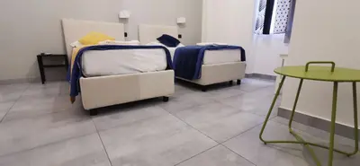Letto o letti in una camera di Hi Relais Rooms