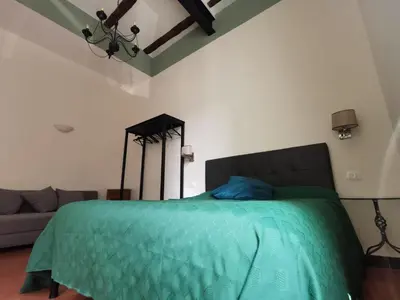 Letto o letti in una camera di Mergellina 121 Apartment's Rooms