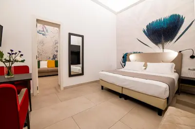 Letto o letti in una camera di B&B Napoli Time
