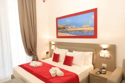 Letto o letti in una camera di Mecla Suites