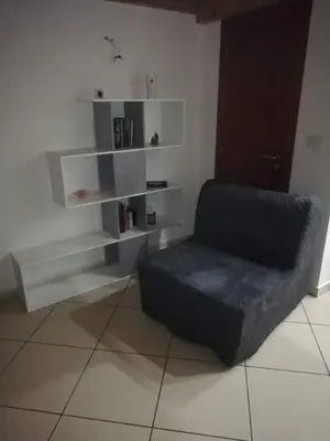 Area soggiorno di Aurora Apartment nel cuore di Napoli