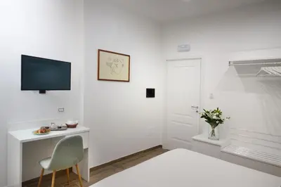 TV o dispositivi per l'intrattenimento presso Napoliseason Rooms & Breakfast