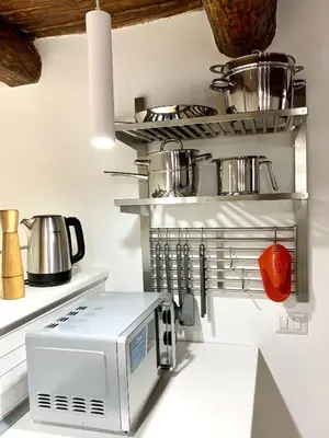 Cucina o angolo cottura di SECRET ROOM NAPLES historic center