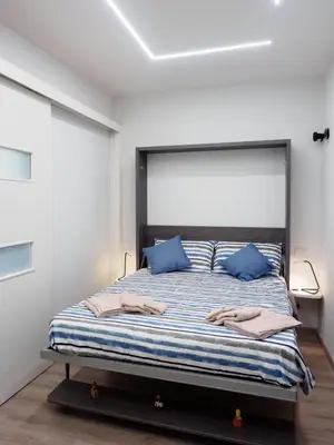 Letto o letti in una camera di Plebiscito Home Holidays