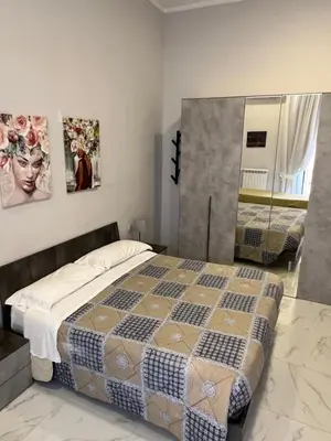 Letto o letti in una camera di San Gennaro in porta