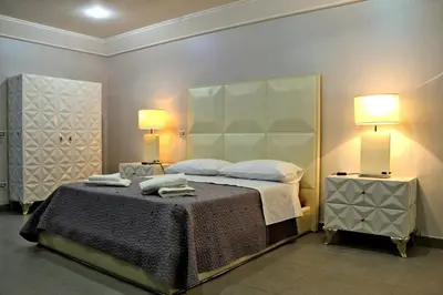 Letto o letti in una camera di Donna Teresa