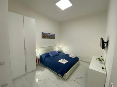 Letto o letti in una camera di Conforti Apartment