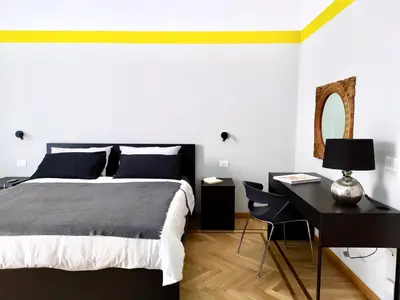 Letto o letti in una camera di NAPOLIXSUITE