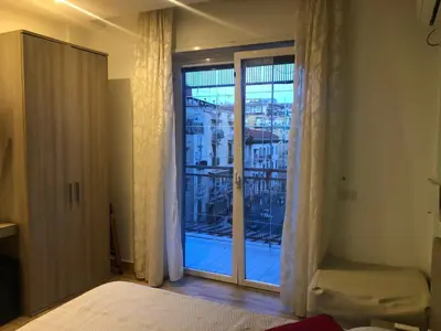 Letto o letti in una camera di B&b Bethel Napoli