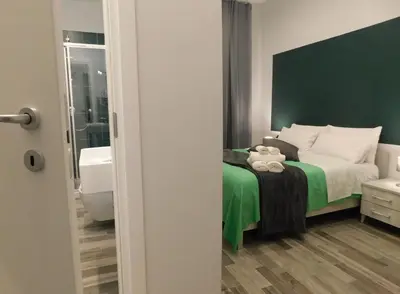 Letto o letti in una camera di Scaramantico Rooms