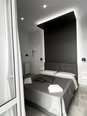 Letto o letti in una camera di Aurora Luxury Rooms