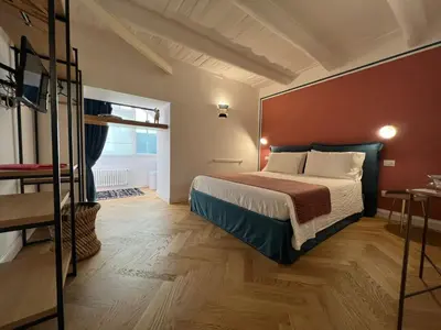 Letto o letti in una camera di Ferrandina1 Guest House