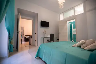 Letto o letti in una camera di New In!Amalie at Santa Lucia