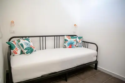 Letto o letti in una camera di AllYouCanTrip - La Nova