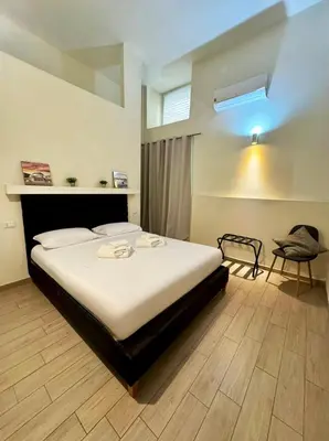 Letto o letti in una camera di Centro Storico Maison