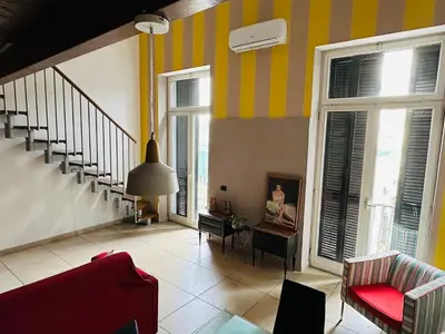 Area soggiorno di Loft al Teatro San Carlo