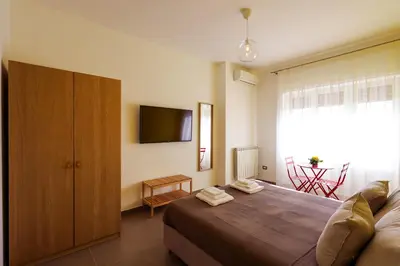TV o dispositivi per l'intrattenimento presso NEAPOLITAN SKYSCRAPER APARTMENT