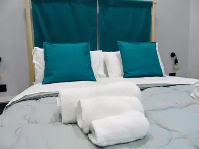 Letto o letti in una camera di Cabà bed&breakfast