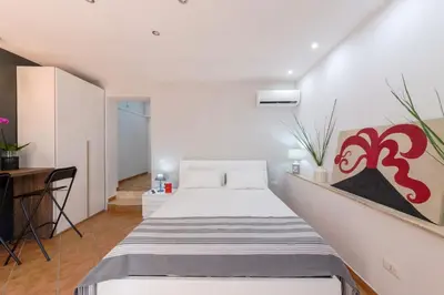 Letto o letti in una camera di Masaniello Apartment