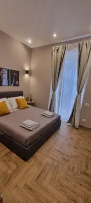 Letto o letti in una camera di Masaniello Apartment