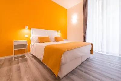 Letto o letti in una camera di Napoliving