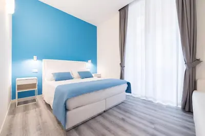 Letto o letti in una camera di Napoliving