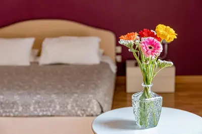 Letto o letti in una camera di B&B Ruffo di Bagnara Palazzo Monumentale