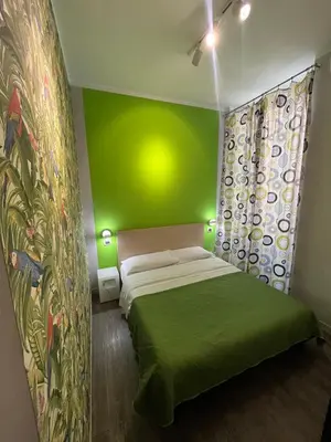 Letto o letti in una camera di H Rooms boutique Hotel