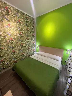 Letto o letti in una camera di H Rooms boutique Hotel