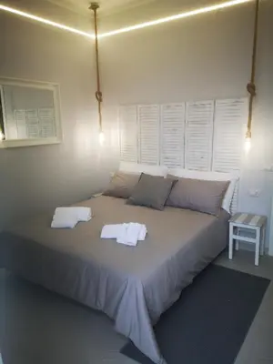 Letto o letti in una camera di SpiderRooms